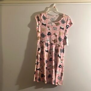 Pink dress with cats on them
